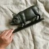 One Hundred Eighty Degress Cast Iron Pig Doorstop