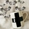 CREATIVE COOP Mugs Swiss Cross Mug - Cream + Black