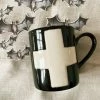CREATIVE COOP Mugs Swiss Cross Mug - Black + Cream